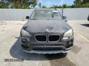 ✅ 2015 BMW X1 xDrive28i • VIN: WBAVL1C53FVY32967 • Lot: 70714155. Listed on Copart with 136,587 mi. Free auction sales archive from the USA and detailed vehicle history report at DreamBid. Image 5.