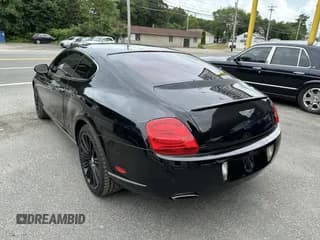 ✅ 2007 Bentley Continental GT • VIN: SCBCR73W17C040241 • Lot: 43794835. Wystawiony na IAAI z przebiegiem 92 913 mil. Bezpłatny archiwum sprzedaży aukcyjnych z USA i szczegółowy raport historii pojazdu na DreamBid. Zdjęcie 3.