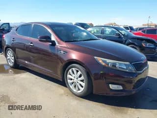 ✅ 2015 Kia Optima EX • VIN: 5XXGN4A75FG453671 • Lot: 43496967. Listed on IAAI with 113,974 mi. Free auction sales archive from the USA and detailed vehicle history report at DreamBid. Image 1.