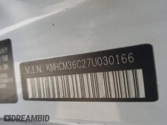 2007 Hyundai Accent GS with VIN KMHCM36C27U030166, listed as a Copart auction lot 67738154 with 174,856 mi miles and Salvage title. Bid and sale history available at DreamBid. Image 12.