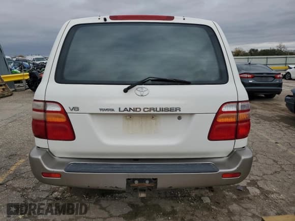 ✅ 1999 Toyota Land Cruiser • VIN: JT3HT05JXX0049250 • Lot: 80630194. Listed on Copart with 348,940 mi. Free auction sales archive from the USA and detailed vehicle history report at DreamBid. Image 6.