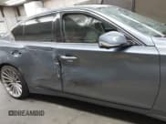 ✅ 2015 Infiniti Q50 Premium • VIN: JN1BV7AP6FM337369 • Lot: 41788419. Listed on IAAI with 106,977 mi. Free auction sales archive from the USA and detailed vehicle history report at DreamBid. Image 13.