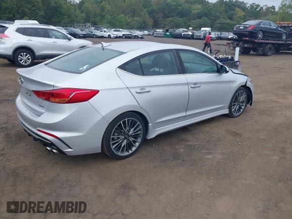 ✅ 2018 Hyundai Elantra Sport • VIN: KMHD04LB7JU681320 • Lot: 43249057. Listed on IAAI with 83,476 mi. Free auction sales archive from the USA and detailed vehicle history report at DreamBid. Image 4.