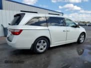 ✅ 2012 Honda Odyssey Touring • VIN: 5FNRL5H94CB025228 • Lot: 90727425. Listed on Copart with 181,427 mi. Free auction sales archive from the USA and detailed vehicle history report at DreamBid. Image 3.