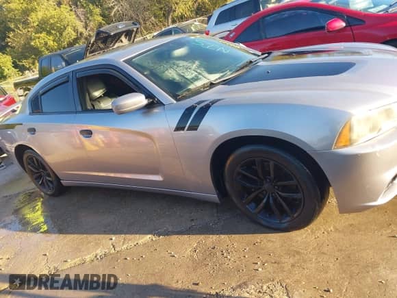 2014 Dodge Charger SXT with VIN 2C3CDXHG2EH239214, listed as a IAAI auction lot 43595966 with 219,931 mi miles and . Bid and sale history available at DreamBid. Image 13.