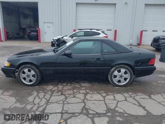 ✅ 2000 Mercedes-Benz SL 500 • VIN: WDBFA68F7YF193189 • Лот: 43392043. Опубликован ранее на IAAI с пробегом 90 807 миль. Бесплатный доступ к архиву аукционных продаж из США и подробный отчёт об истории автомобиля на DreamBid. Изображение 15.