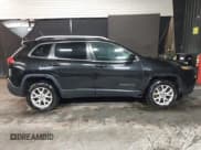 ✅ 2014 Jeep Cherokee Altitude • VIN: 1C4PJMCS0EW220176 • Lot: 42162678. Listed on IAAI with 127,370 mi. Free auction sales archive from the USA and detailed vehicle history report at DreamBid. Image 14.