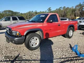 2002 Dodge Dakota z VIN 1B7FL16X42S720579, wystawiony jako Copart lot #88160015 z przebiegiem 164 279 mil mil oraz Szkoda całkowita • Salvage title. Historia ofert i sprzedaży dostępna na DreamBid. Obrazek 1.