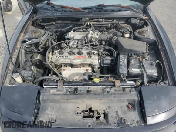 ✅ 1992 Toyota Celica • VIN: JT2AT86F2N0079144 • Лот: 73714164. Опубликован ранее на Copart с пробегом 188 930 миль. Бесплатный доступ к архиву аукционных продаж из США и подробный отчёт об истории автомобиля на DreamBid. Изображение 11.