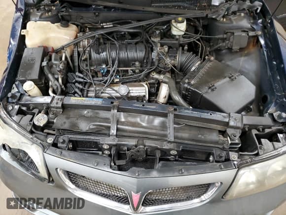 ✅ 2004 Pontiac Bonneville SE • VIN: 1G2HX52KX4U211073 • Lot: 70049924. Wystawiony na Copart z przebiegiem 157 777 mil. Bezpłatny archiwum sprzedaży aukcyjnych z USA i szczegółowy raport historii pojazdu na DreamBid. Zdjęcie 11.