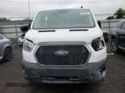 ✅ 2023 Ford Transit Cargo • VIN: 1FTBR1Y80PKA55285 • Lot: 60306425. Listed on Copart with 26,810 mi. Free auction sales archive from the USA and detailed vehicle history report at DreamBid. Image 5.