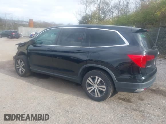 ✅ 2017 Honda Pilot EX-L • VIN: 5FNYF6H55HB062267 • Lot: 43680104. Listed on IAAI with 119,797 mi. Free auction sales archive from the USA and detailed vehicle history report at DreamBid. Image 3.