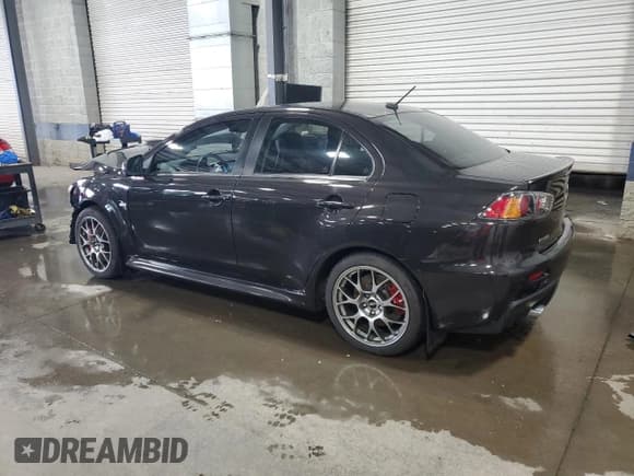 ✅ 2014 Mitsubishi Lancer Evolution MR • VIN: JA32W5FV7EU007274 • Лот: 70159245. Опубликован ранее на Copart с пробегом 72 155 миль. Бесплатный доступ к архиву аукционных продаж из США и подробный отчёт об истории автомобиля на DreamBid. Изображение 2.