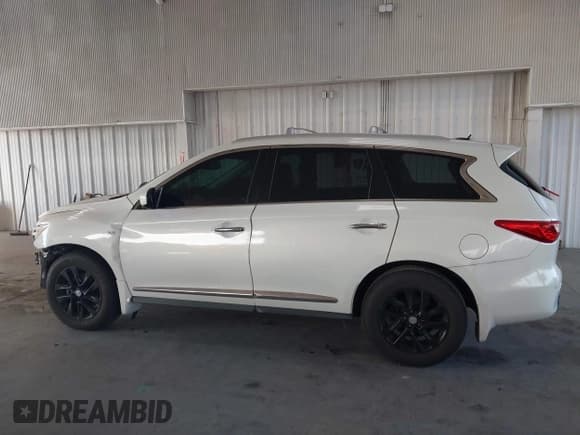 ✅ 2014 Infiniti QX60 • VIN: 5N1AL0MN9EC521348 • Lot: 43777864. Listed on IAAI with 152,003 mi. Free auction sales archive from the USA and detailed vehicle history report at DreamBid. Image 15.