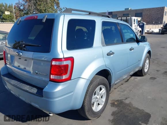 ✅ 2009 Ford Escape Hybrid • VIN: 1FMCU493X9KA33137 • Lot: 42077410. Listed on IAAI with 195,580 mi. Free auction sales archive from the USA and detailed vehicle history report at DreamBid. Image 4.