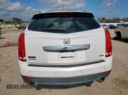 ✅ 2015 Cadillac SRX Performance Collection • VIN: 3GYFNCE39FS607266 • Lot: 90239145. Listed on Copart with 124,658 mi. Free auction sales archive from the USA and detailed vehicle history report at DreamBid. Image 6.