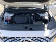 ✅ 2021 Hyundai Santa Fe Limited • VIN: 5NMS4DAL2MH344450 • Лот: 70203663. Опубликован ранее на Copart с пробегом 16 337 миль. Бесплатный доступ к архиву аукционных продаж из США и подробный отчёт об истории автомобиля на DreamBid. Изображение 13.