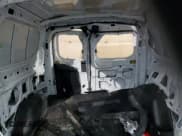 ✅ 2024 Ford Transit Cargo • VIN: 1FTYE1Y88RKA20387 • Lot: 89136935. Listed on Copart with 30,190 mi. Free auction sales archive from the USA and detailed vehicle history report at DreamBid. Image 10.