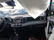 ✅ 2018 Toyota RAV4 LE • VIN: JTMBFREV8JJ729942 • Lot: 43557394. Listed on IAAI with 108,053 mi. Free auction sales archive from the USA and detailed vehicle history report at DreamBid. Image 5.