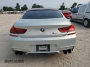 ✅ 2017 BMW M6 • VIN: WBS6E9C56HG437374 • Lot: 54277624. Listed on Copart with 80,858 mi. Free auction sales archive from the USA and detailed vehicle history report at DreamBid. Image 6.