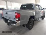 ✅ 2021 Toyota Tacoma SR5 • VIN: 5TFAZ5CN9MX115532 • Lot: 43208018. Listed on IAAI with 25,144 mi. Free auction sales archive from the USA and detailed vehicle history report at DreamBid. Image 4.