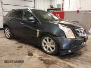 ✅ 2015 Cadillac SRX Premium Collection • VIN: 3GYFNGE30FS607373 • Lot: 42868728. Wystawiony na IAAI z przebiegiem 109 910 mil. Bezpłatny archiwum sprzedaży aukcyjnych z USA i szczegółowy raport historii pojazdu na DreamBid. Zdjęcie 1.