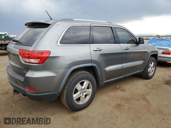 ✅ 2011 Jeep Grand Cherokee Laredo • VIN: 1J4RR4GG1BC734682 • Lot: 60708395. Listed on Copart with 188,670 mi. Free auction sales archive from the USA and detailed vehicle history report at DreamBid. Image 3.