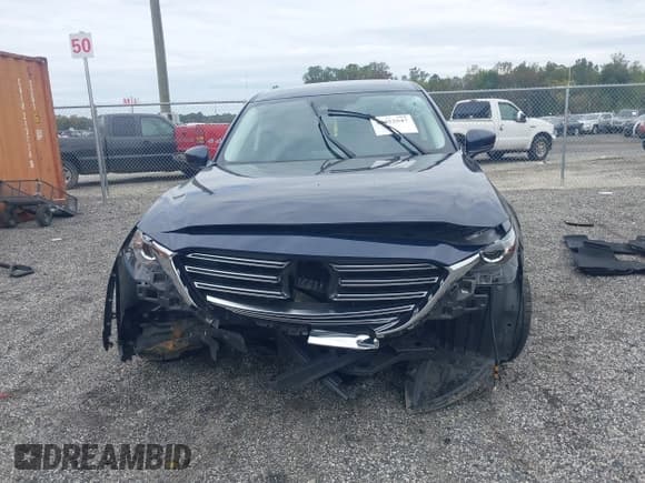 ✅ 2021 Mazda CX-9 Touring • VIN: JM3TCBCYXM0521709 • Lot: 43452547. Listed on IAAI with 50,115 mi. Free auction sales archive from the USA and detailed vehicle history report at DreamBid. Image 12.