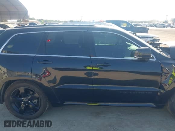 ✅ 2016 Jeep Grand Cherokee Overland • VIN: 1C4RJFCT6GC471673 • Lot: 40584190. Listed on IAAI with 128,482 mi. Free auction sales archive from the USA and detailed vehicle history report at DreamBid. Image 14.