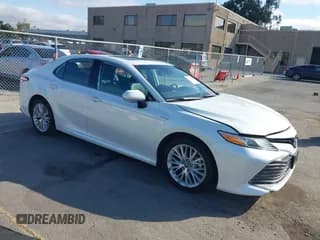 ✅ 2020 Toyota Camry Hybrid XLE • VIN: 4T1F31AK4LU523702 • Lot: 42734831. Listed on IAAI with 144,778 mi. Free auction sales archive from the USA and detailed vehicle history report at DreamBid. Image 1.