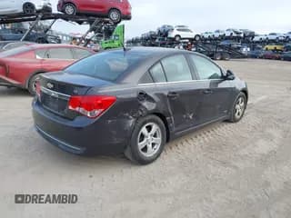 ✅ 2014 Chevrolet Cruze 1LT • VIN: 1G1PC5SB5E7140456 • Lot: 43527056. Listed on IAAI with 45,788 mi. Free auction sales archive from the USA and detailed vehicle history report at DreamBid. Image 4.