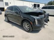 ✅ 2021 Cadillac XT4 FWD Premium Luxury • VIN: 1GYFZCR48MF002468 • Lot: 50878955. Listed on Copart with 76,034 mi. Free auction sales archive from the USA and detailed vehicle history report at DreamBid. Image 11.