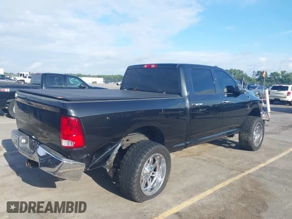 ✅ 2015 Ram 2500 Tradesman • VIN: 3C6UR5CL9FG705658 • Lot: 42729218. Listed on IAAI with 114,164 mi. Free auction sales archive from the USA and detailed vehicle history report at DreamBid. Image 4.