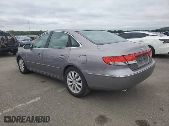 2007 Hyundai Azera SE с VIN KMHFC46F97A188781, выставлен на аукционе Copart как лот 66612805 с пробегом 144 099 миль миль и Списание • Salvage title. История ставок и продаж доступна на DreamBid. Изображение 2.
