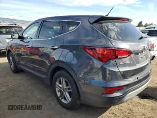 ✅ 2018 Hyundai Santa Fe 2.4L • VIN: 5XYZT3LB0JG569214 • Лот: 77777993. Опубликован ранее на Copart с пробегом Не указан. Бесплатный доступ к архиву аукционных продаж из США и подробный отчёт об истории автомобиля на DreamBid. Изображение 2.
