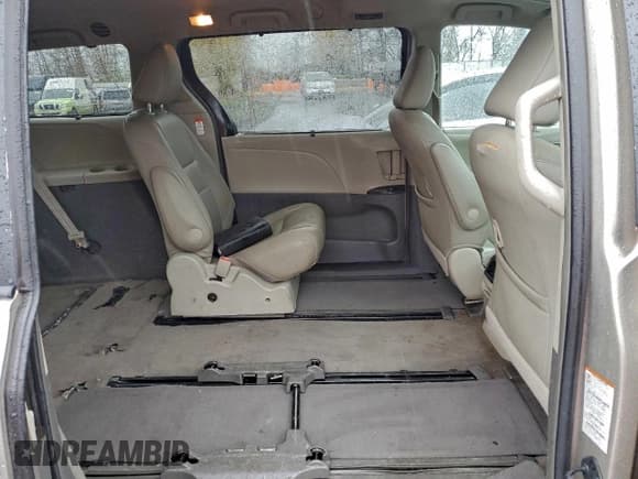 ✅ 2015 Toyota Sienna XLE • VIN: 5TDDK3DC6FS097325 • Lot: 96090135. Listed on Copart with 297,330 mi. Free auction sales archive from the USA and detailed vehicle history report at DreamBid. Image 11.