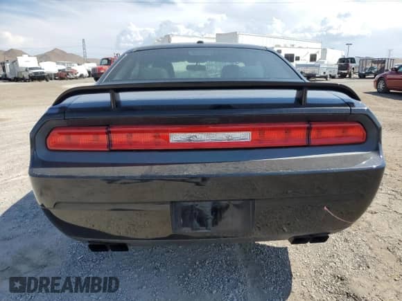 2014 Dodge Challenger R/T z VIN 2C3CDYBT2EH298517, wystawiony jako Copart lot #64642864 z przebiegiem 97 070 mil mil oraz Szkoda całkowita • Salvage title. Historia ofert i sprzedaży dostępna na DreamBid. Obrazek 6.