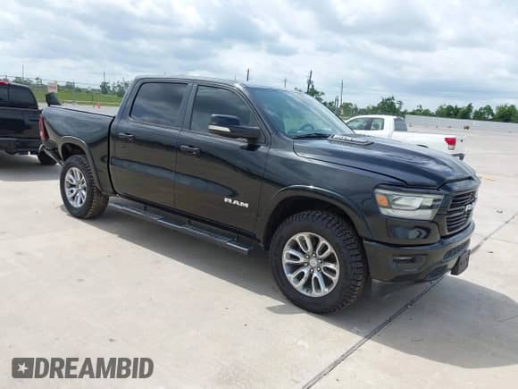 2020 Ram 1500 Laramie with VIN 1C6RREJT2LN295149, listed as a IAAI auction lot 42411146 with 113,445 mi miles and . Bid and sale history available at DreamBid. Image 1.