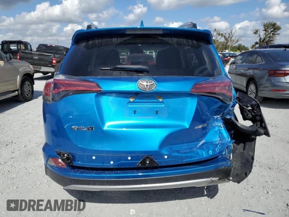 ✅ 2018 Toyota RAV4 Limited • VIN: JTMYFREV4JJ201504 • Lot: 91853185. Listed on Copart with 32,997 mi. Free auction sales archive from the USA and detailed vehicle history report at DreamBid. Image 6.