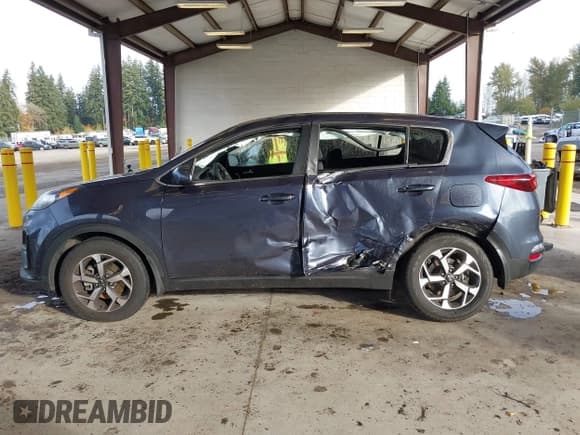 ✅ 2020 Kia Sportage LX • VIN: KNDPM3AC8L7757222 • Лот: 43571413. Опубликован ранее на IAAI с пробегом 87 351 миль. Бесплатный доступ к архиву аукционных продаж из США и подробный отчёт об истории автомобиля на DreamBid. Изображение 14.