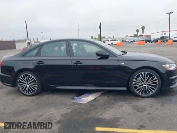 ✅ 2018 Audi A6 Premium • VIN: WAUC8AFC6JN108315 • Лот: 42020651. Опубликован ранее на IAAI с пробегом 23 690 миль. Бесплатный доступ к архиву аукционных продаж из США и подробный отчёт об истории автомобиля на DreamBid. Изображение 13.