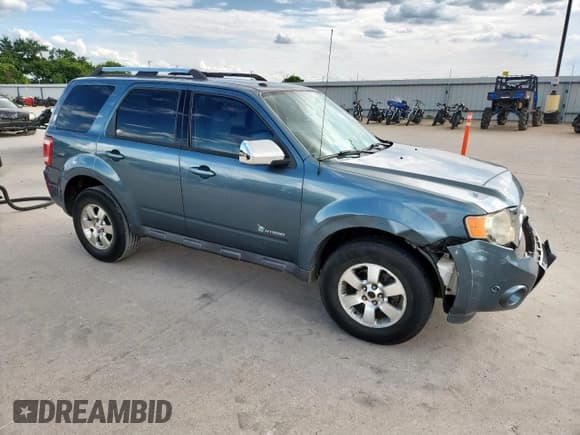 ✅ 2011 Ford Escape Hybrid • VIN: 1FMCU4K35BKA47317 • Lot: 63335355. Listed on Copart with 149,837 mi. Free auction sales archive from the USA and detailed vehicle history report at DreamBid. Image 4.