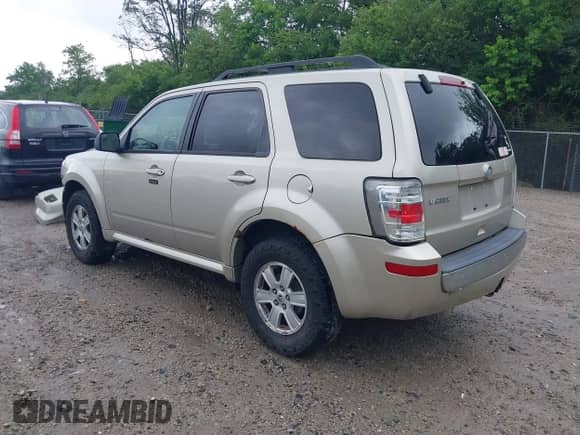 2010 Mercury Mariner z VIN 4M2CN8B73AKJ05123, wystawiony jako IAAI lot #42512923 z przebiegiem 240 736 mil mil oraz . Historia ofert i sprzedaży dostępna na DreamBid. Obrazek 3.