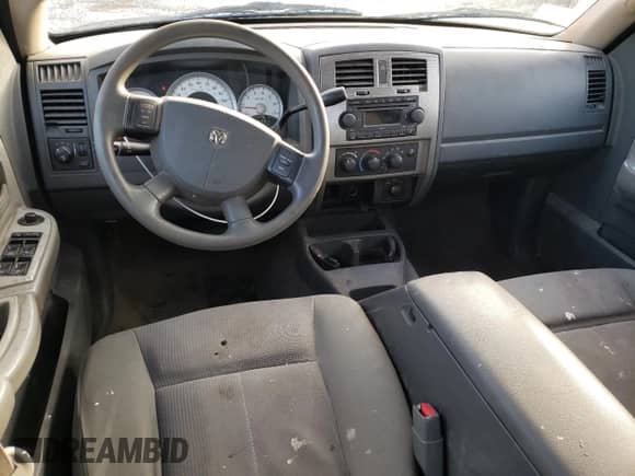 2006 Dodge Dakota SLT с VIN 1D7HW48N46S646881, выставлен на аукционе Copart как лот 82167974 с пробегом 188 071 миль миль и Списание • Salvage title. История ставок и продаж доступна на DreamBid. Изображение 8.