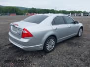 ✅ 2011 Ford Fusion Hybrid • VIN: 3FADP0L35BR221881 • Lot: 42459138. Listed on IAAI with 117,116 mi. Free auction sales archive from the USA and detailed vehicle history report at DreamBid. Image 4.