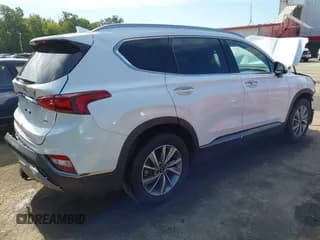 ✅ 2020 Hyundai Santa Fe Limited • VIN: 5NMS5CAD9LH150626 • Лот: 43112744. Опубликован ранее на IAAI с пробегом 69 955 миль. Бесплатный доступ к архиву аукционных продаж из США и подробный отчёт об истории автомобиля на DreamBid. Изображение 4.