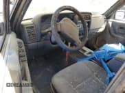 ✅ 1999 Jeep Cherokee Sport • VIN: 1J4FT68S0XL555883 • Lot: 51016255. Listed on Copart with 128,306 mi. Free auction sales archive from the USA and detailed vehicle history report at DreamBid. Image 8.