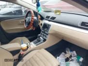 ✅ 2013 Volkswagen CC R-Line • VIN: WVWBP7AN6DE547662 • Lot: 42749969. Wystawiony na IAAI z przebiegiem 124 019 mil. Bezpłatny archiwum sprzedaży aukcyjnych z USA i szczegółowy raport historii pojazdu na DreamBid. Zdjęcie 5.