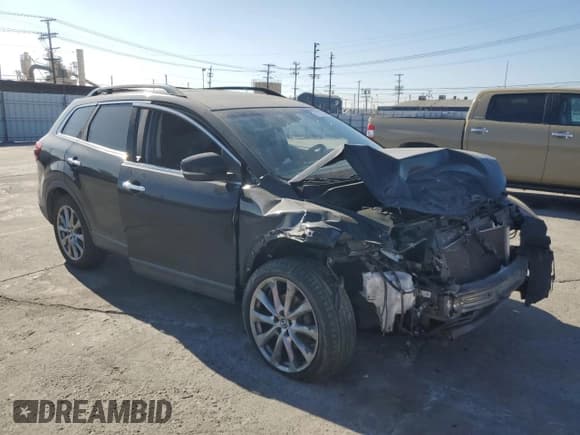 ✅ 2015 Mazda CX-9 Grand Touring • VIN: JM3TB2DV7F0468784 • Lot: 91723295. Listed on Copart with Not provided. Free auction sales archive from the USA and detailed vehicle history report at DreamBid. Image 4.