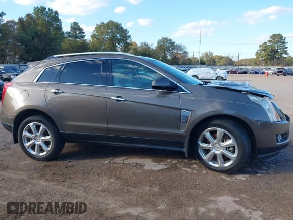 ✅ 2015 Cadillac SRX Premium Collection • VIN: 3GYFNGE33FS550036 • Lot: 43666691. Listed on IAAI with 122,592 mi. Free auction sales archive from the USA and detailed vehicle history report at DreamBid. Image 13.